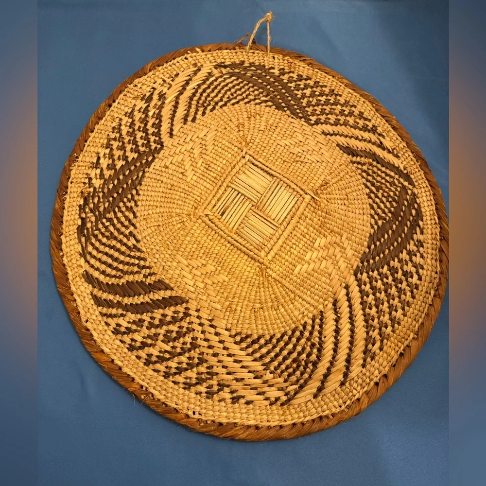 Vintage handwoven Tonga basket. Made with natural materials. Home decor.